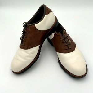 Redbox Golf Shoes Men’s size 9 1/2 brown and white with black soles.